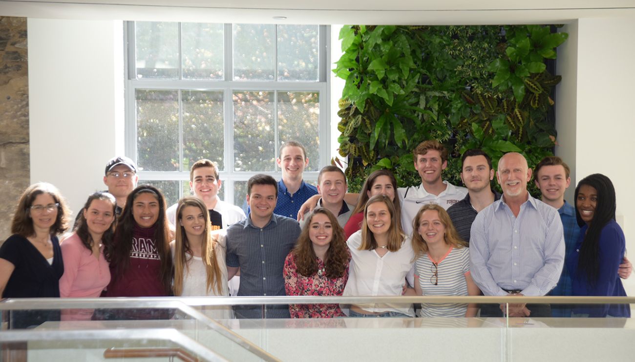 Students gathered on a balcony at Fordham's Social Innovation Collaboratory